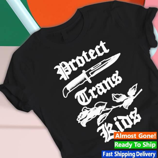 Peggy Flanagan Wearing Protect Trans Kids shirt